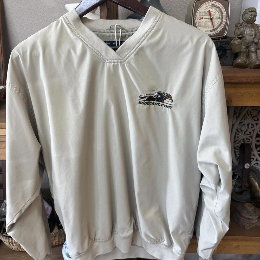 Cream and white lightweight rain jacket with embroidered logo